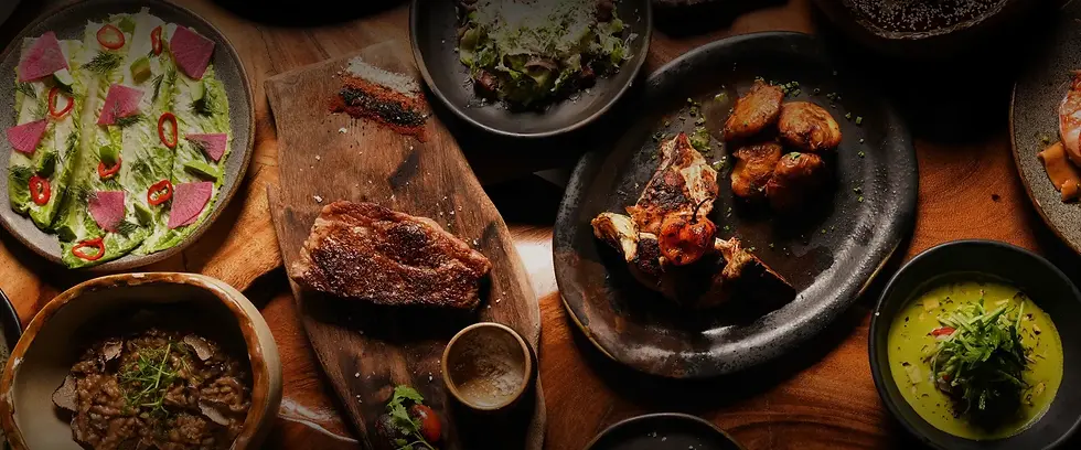 Varios platillos gourmet del menú del restaurante Rosa Negra Miami